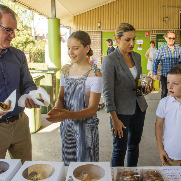 Michael Daley with his family, voting at Chifley Public School.