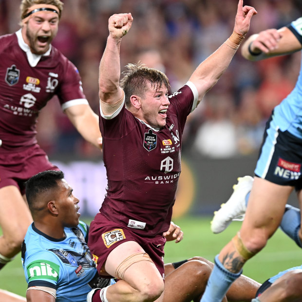 Harry Grant of the Maroons celebrates a try in Origin III.