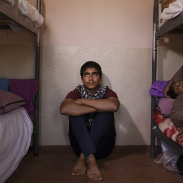 Ahmed Nazari, 17, in a room he shares with other unaccompanied minors at the Gazergah Transit Centre.