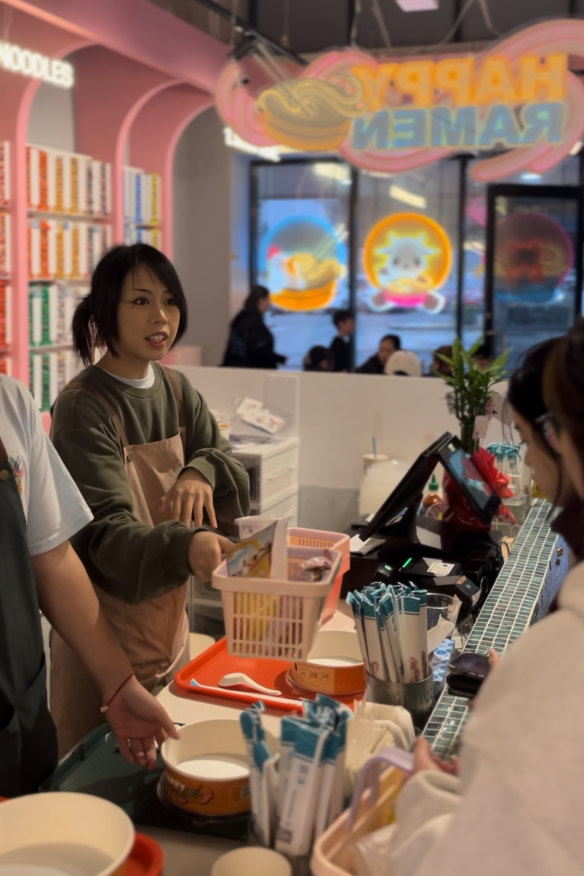 Take your selections to the counter before cooking at Happy Ramen.