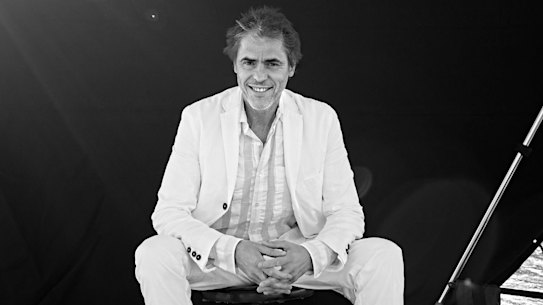 Tim wears Ian Nessick suit and shirt, Marc Newson x R. M. Williams boots, Uniqlo socks.