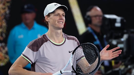 Jannik Sinner of Italy celebrates after defeating Andrey Rublev of Russia in their quarterfinal match at the Australian Open tennis championships at Melbourne Park, Melbourne, Australia, Wednesday, Jan. 24, 2024.(AP Photo/Asanka Brendon Ratnayake)