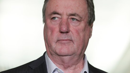 Former AFP boss Mick Keelty has admitted passing on information about a police investigation to its target.