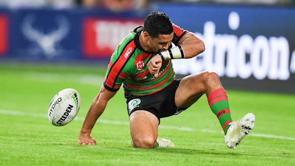 This one's for you, Mum: Cody Walker salutes his mother Linda, who died one year ago, after scoring for the Rabbitohs.