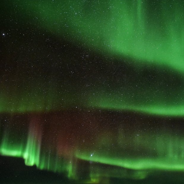 The breathtaking Aurora Australis view from onboard the flight.