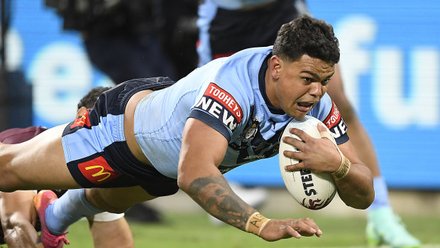 Latrell Mitchell crosses in NSW’s big win.