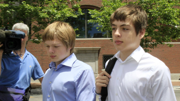 Alexander Vavilov, right, and his older brother brother Tim leave a federal court after a bail hearing for their parents Donald Heathfield and Tracey Ann Foley, in Boston, Massachusetts, in 2010.