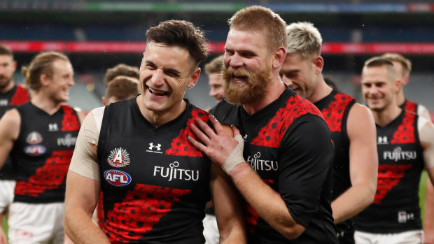 Mitchell Hibberd and Michael Hurley celebrate the Bombers win over Collingwood on Friday night