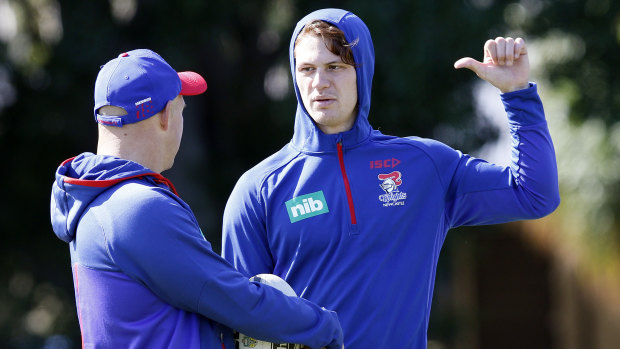 Code swapper?: Kalyn Ponga talks with coach Nathan Brown during a training session at Balance Field in Mayfield.