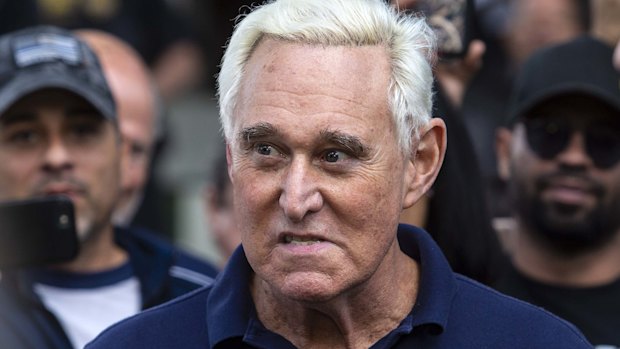 Roger Stone, former adviser to Donald Trump's presidential campaign, leaves federal court in Fort Lauderdale, Florida, after being charged with obstruction.