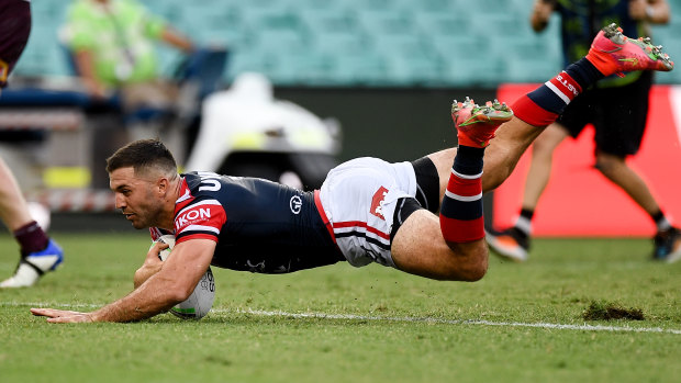 James Tedesco scores one of his three tries on the opening weekend of the season.