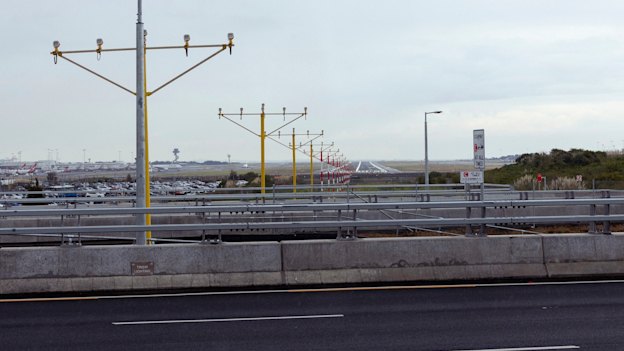 Light poles for the gateway motorway near Sydney Airport’s main north-south runway are only about three metres tall, less than a third the height of standard street lights.