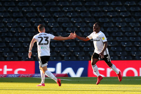 Neeskens Kebano celebrates after scoring for Fulham in the second leg against Brentford.  The Londoners advanced to the play-off final despite a 2-1 loss to Cardiff City.