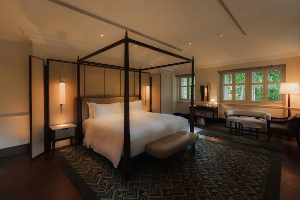 One of three bedrooms inside a colonial manor.