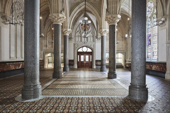 The Cathedral Room’s gothic revival interior includes solid limestone walls, solid granite columns, and stone vaulted ceilings. 