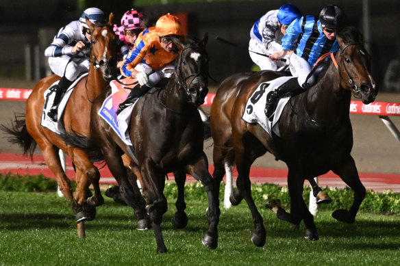 Imperatriz (orange colours) wins the Moir Stakes at Moonee Valley last Friday night.