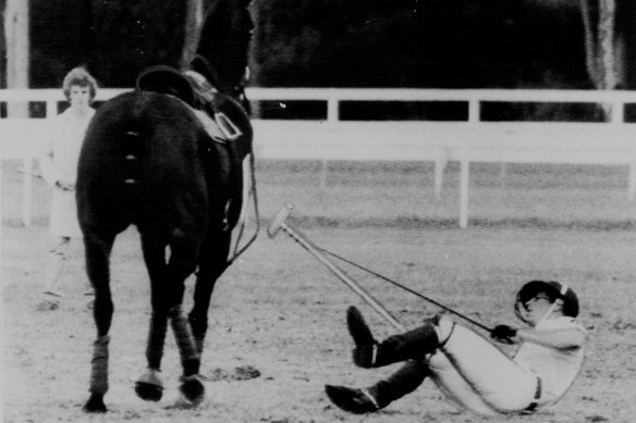 Prince Charles takes a fall at Warwick Farm in 1983 in front of a crowd of 10,000 Australians. He was unhurt and later joked about the incident.