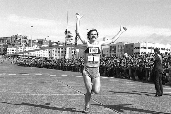 Robert De Castella crossing the finish line at the City to Surf.