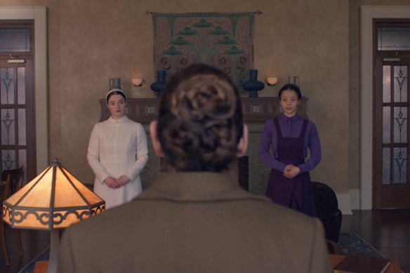 Lucy Halliday (left), Ann Dowd and Chase Infiniti in The Testaments.