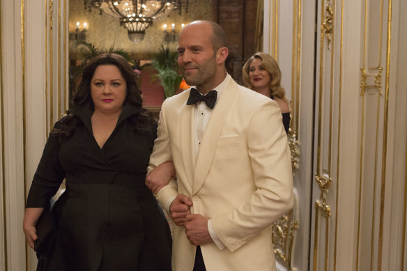 Statham with Melissa McCarthy in Spy, as a CIA agent with a weird obsession with Face/Off.