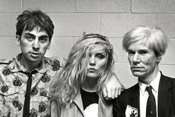 Chris Stein with Debbie Harry and Andy Warhol, who Stein says became “enamoured with celebrities”.