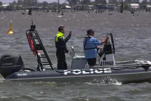 Police search for a missing 16-year-old boy at Lake Mulwala on Monday.