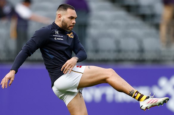 Jarman Impey of the Hawks warms up at Optus Stadium.