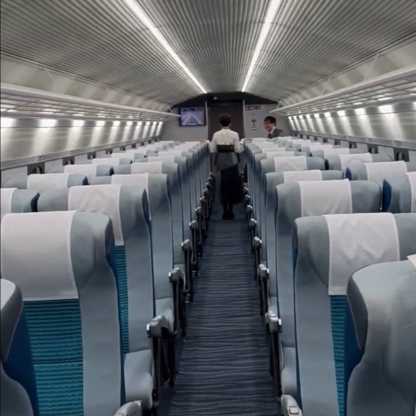 The interior of a Maglev cabin during a test run in Japan.