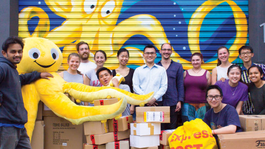 Derek Sheen (centre) and his team at Melbourne gift business Yellow Octopus.