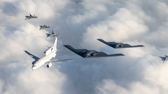 An RAAF Wedgetail flies in formation with Australian and US jets in a file photograph.
