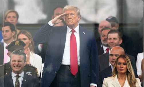 President Donald Trump salutes the military parade commemorating the Army’s 250th anniversary. Also pictured are, from left, Secretary of the Army Daniel Driscoll, Defence Secretary Pete Hegseth, and first lady Melania Trump.