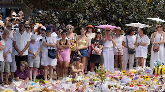 Women gather at a memorial service for the victims of the Bondi terror attack on Sunday's official day of remembrance.