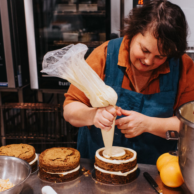 Nadine Ingram prepares carrot cakes with honey cream cheese icing. “I am extremely resilient and persevering,” she says of building Flour and Stone. “… But oh, it was a flogging at the start.”