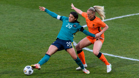 The Netherlands’ Stefanie van der Gragt  (right) is hot on the heels of Australia’s Sam Kerr.