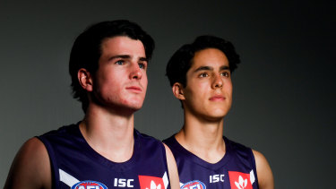 Andrew Brayshaw (left) and Adam Cerra (right) commit to the Fremantle Football Club