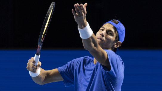 Australia's Alexei Popyrin serves to Italy's Fabio Fognini.