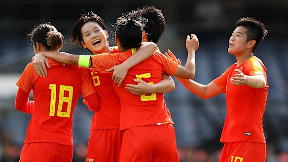 China celebrate after a goal from Wu Haiyan.