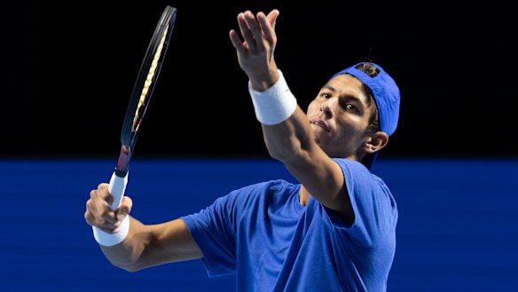 Australia's Alexei Popyrin serves to Italy's Fabio Fognini.