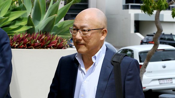 Former Dreamworld employee Bob Tan arrives to give evidence at the inquest.