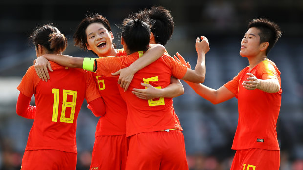 China celebrate after a goal from Wu Haiyan.