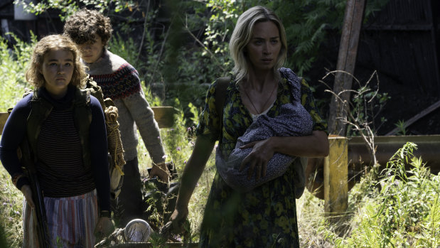 Regan (Millicent Simmonds), Marcus (Noah Jupe) and Evelyn (Emily Blunt) brave the unknown in A Quiet Place Part II.