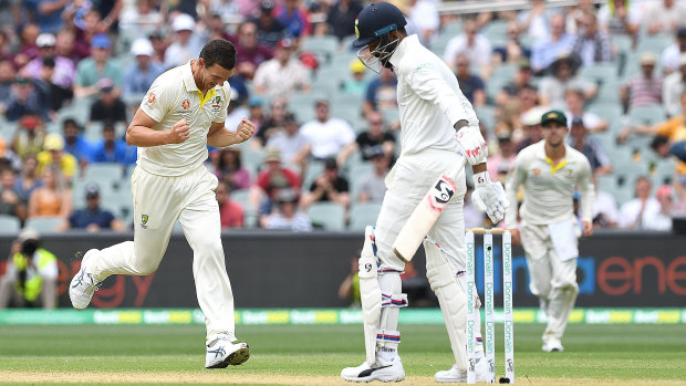 Rare respite: Josh Hazlewood celebrates the wicket of Lokesh Rahul, whose occasional wildness was the exception not the rule.