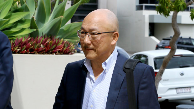 Former Dreamworld employee Bob Tan arrives to give evidence at the inquest.
