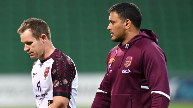 Hodges (right) with Maroons centre Michael Morgan at Origin training.
