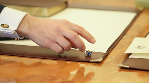 The Australian flag lapel pin handed to ministers by Prime Minister Scott Morrison for their swearing-in by Governor-General Sir Peter Cosgrove. 