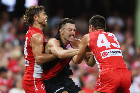 Essendon’s Sam Draper was not  popular with the Swans after giving away a 50-metre penalty for a late spoil.