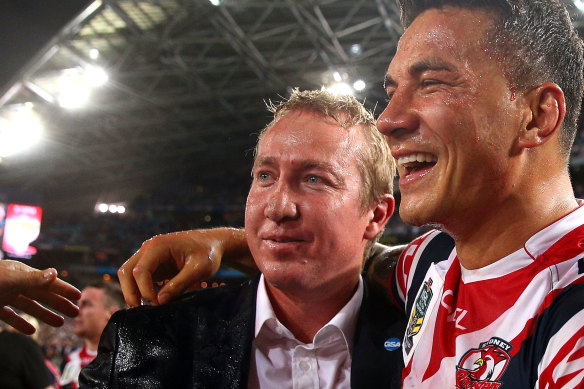 Sonny Bill Williams with Roosters coach Trent Robinson after the 2013 grand final.