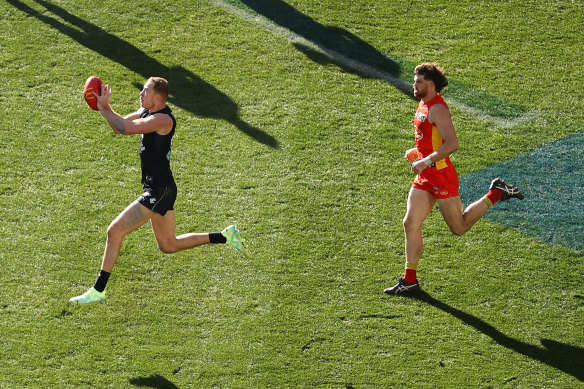 Harry McKay, who kicked three goals,  marks on Sunday.