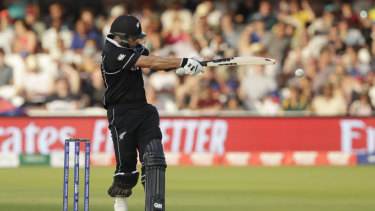 New Zealand's Ross Taylor hits 4 runs off the bowling of Australia's Pat Cummins.