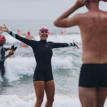 Members of Bold and Beautiful swim squad hit the surf at Manly in 2018.